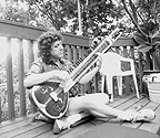 sitar player outside at house party